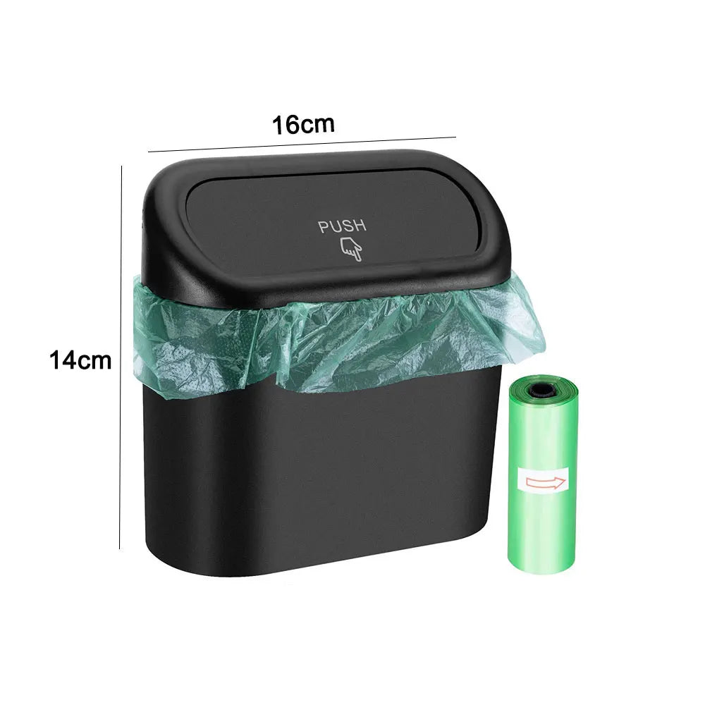Black compact trash bin with a push lid, mini trash bag roll beside it, and size dimensions (16cm x 14cm)
