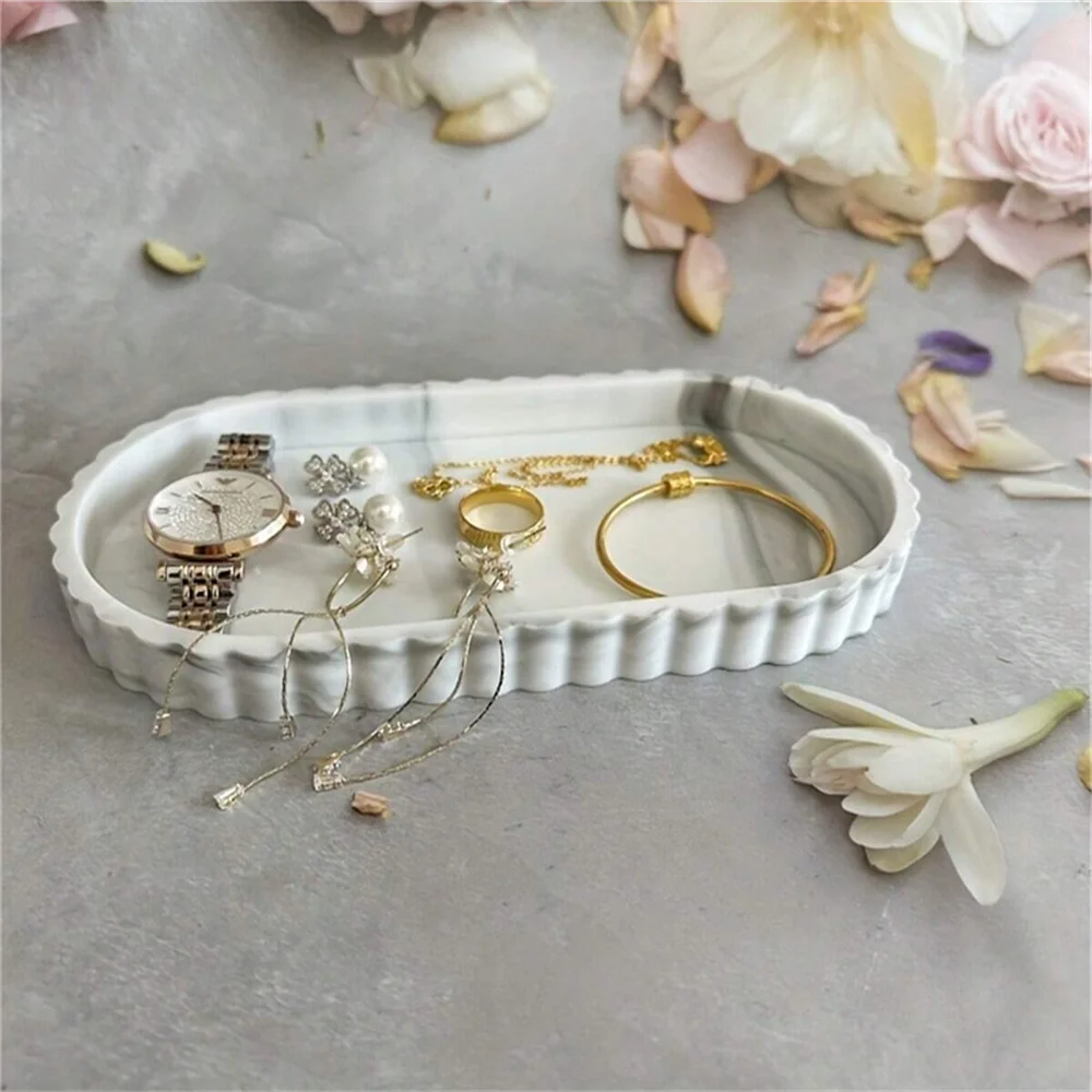 Marble pattern scalloped silicone tray with watch and jewelry