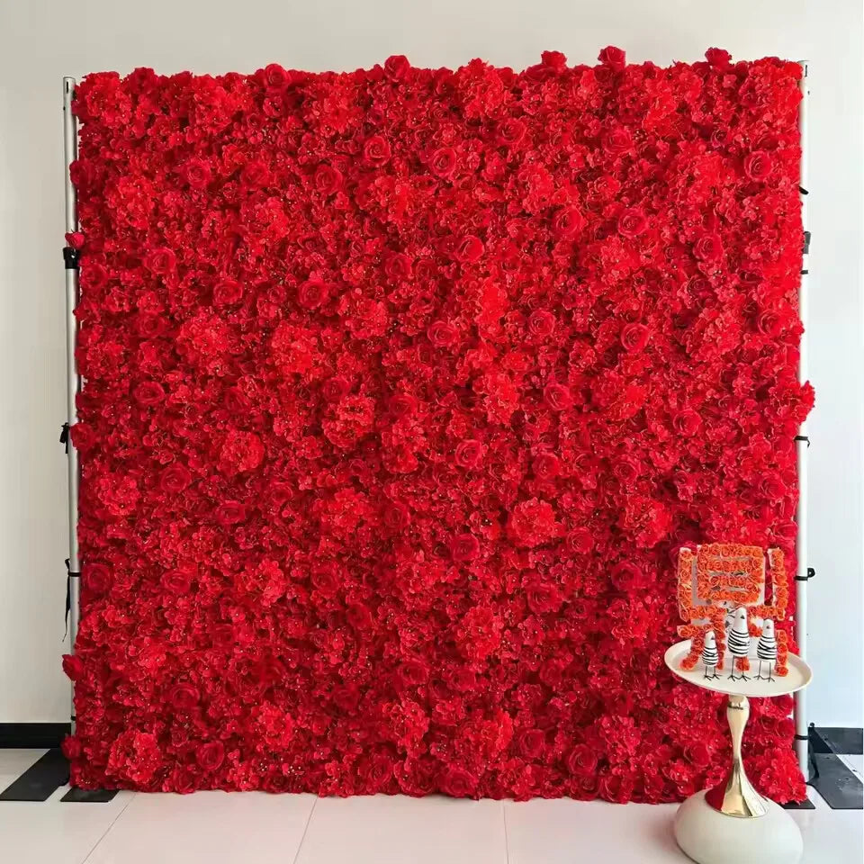 Vibrant red artificial rose flower wall backdrop shown against a neutral indoor wall