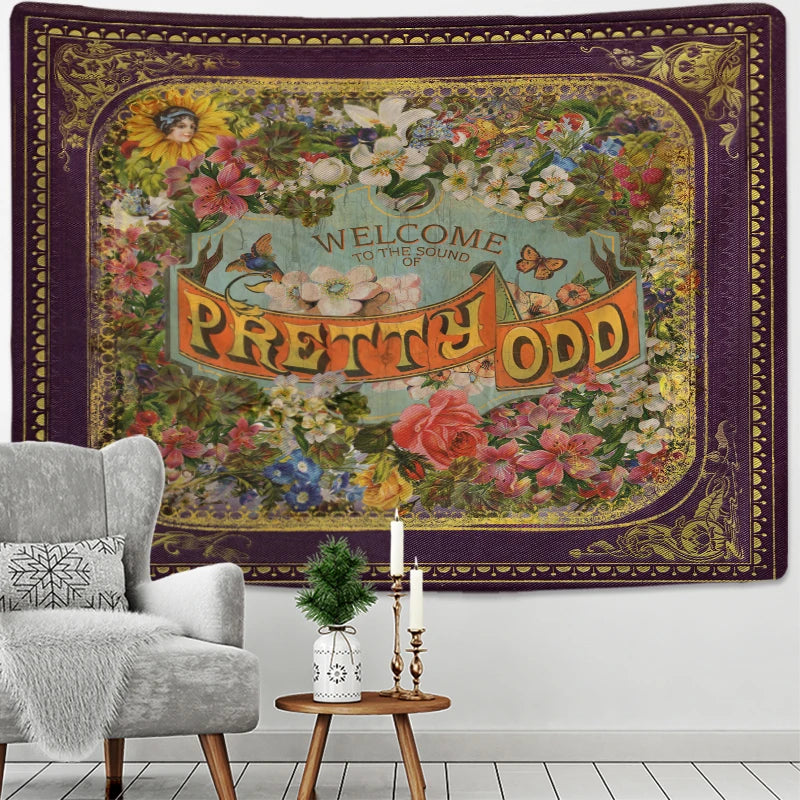 Retro bohemian tapestry hanging behind a cozy reading chair and candles