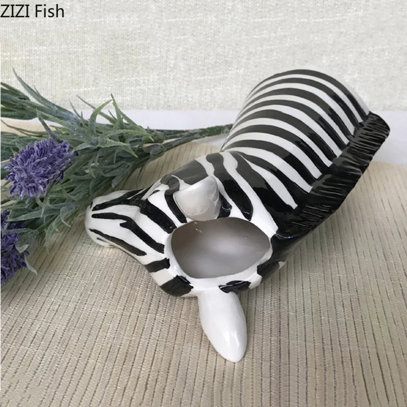 Top opening of zebra head ceramic vase showing inside