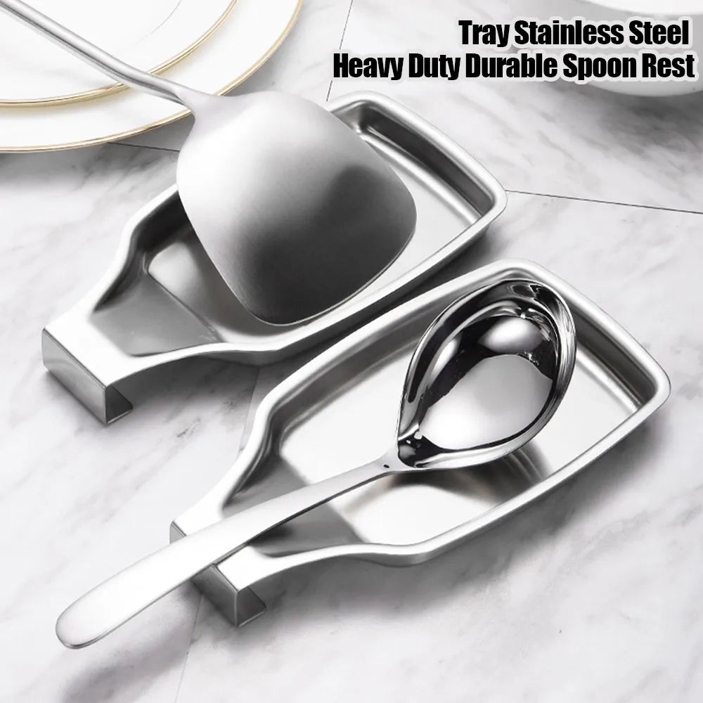 Two stainless steel spoon rests with utensils, displayed on a marble kitchen counter
