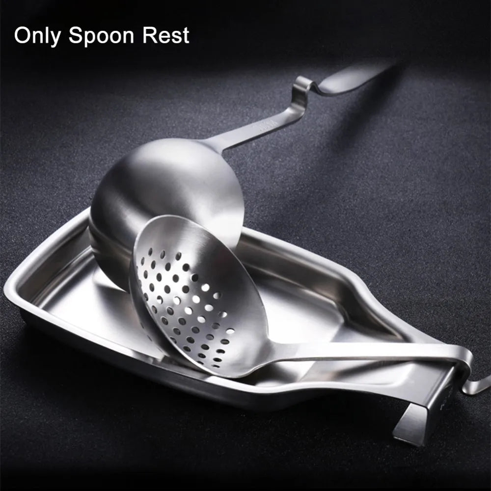 Close-up of stainless steel spoon rest with two ladles, shown on a dark kitchen surface