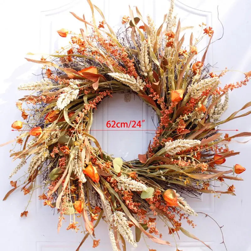 24-inch artificial harvest wheat wreath with diameter measurement indicated, displayed on a white door