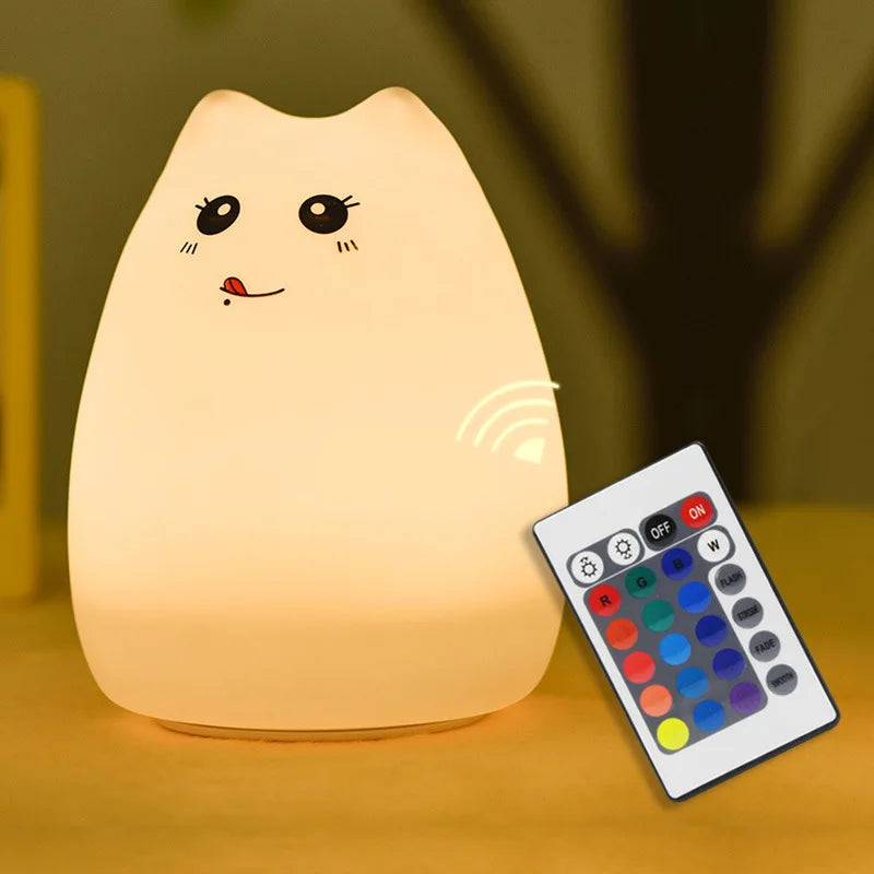 cat night light with cute face and remote control, lit in warm white