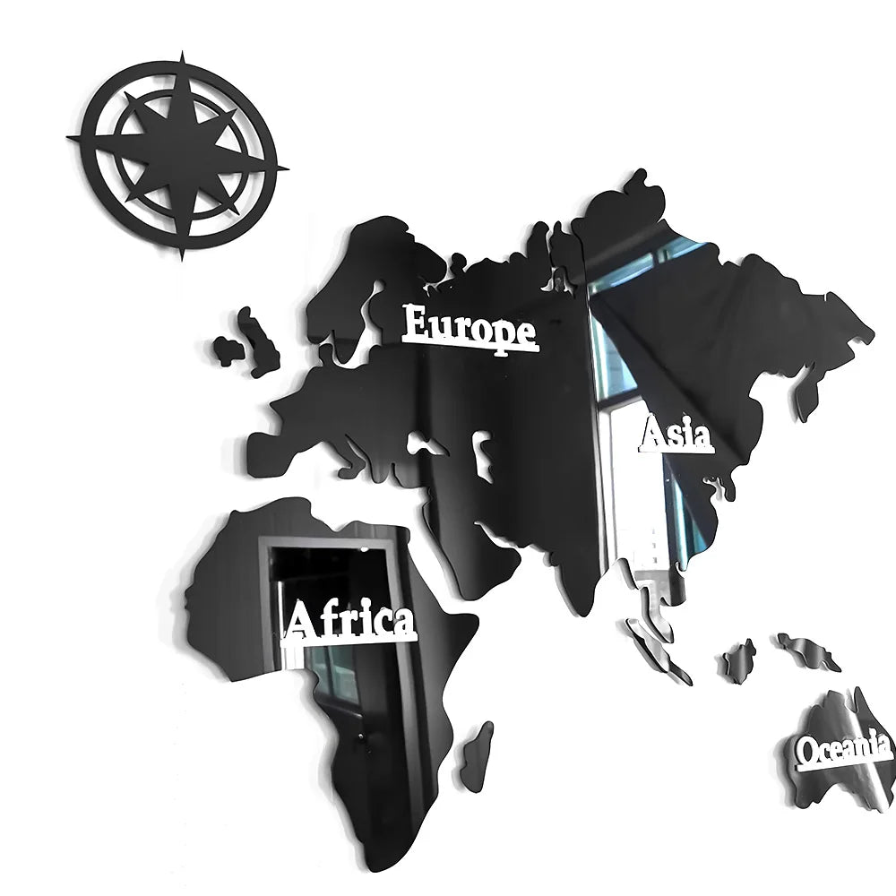 Close-up of glossy black acrylic continents Europe, Asia, Africa with compass accent