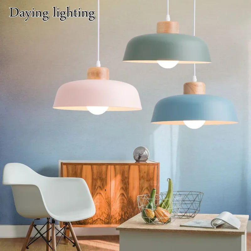 Scandinavian pastel pendant lights over a minimalist dining area