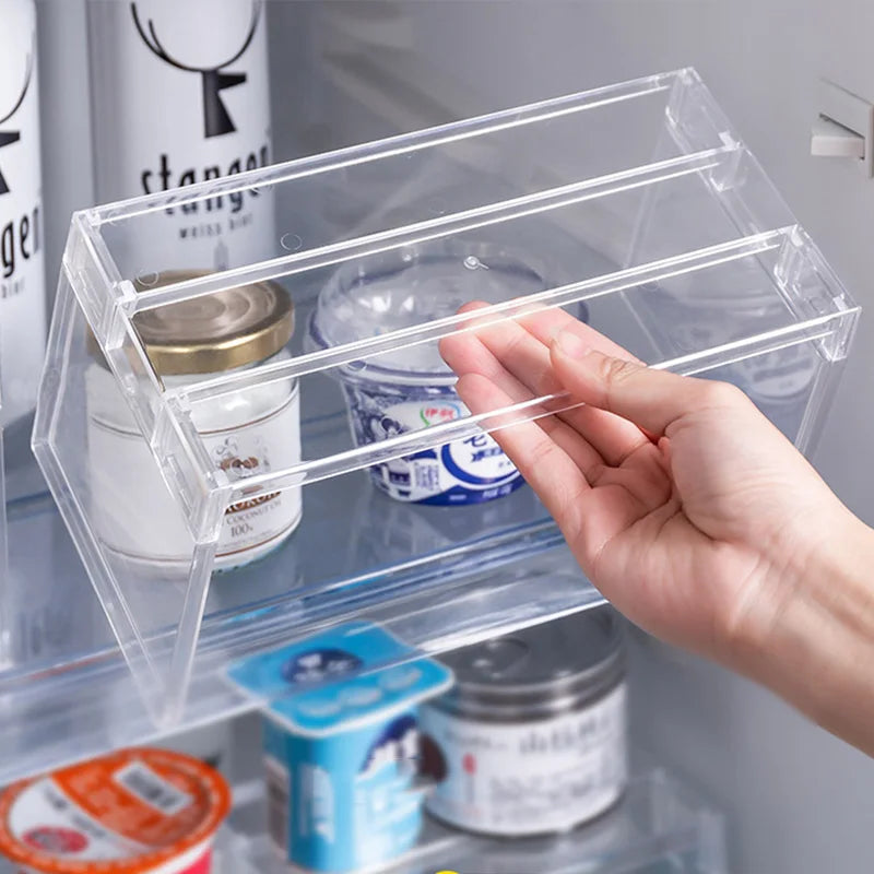 Shelf organizer used in a refrigerator to stack jars, yogurt, and food containers