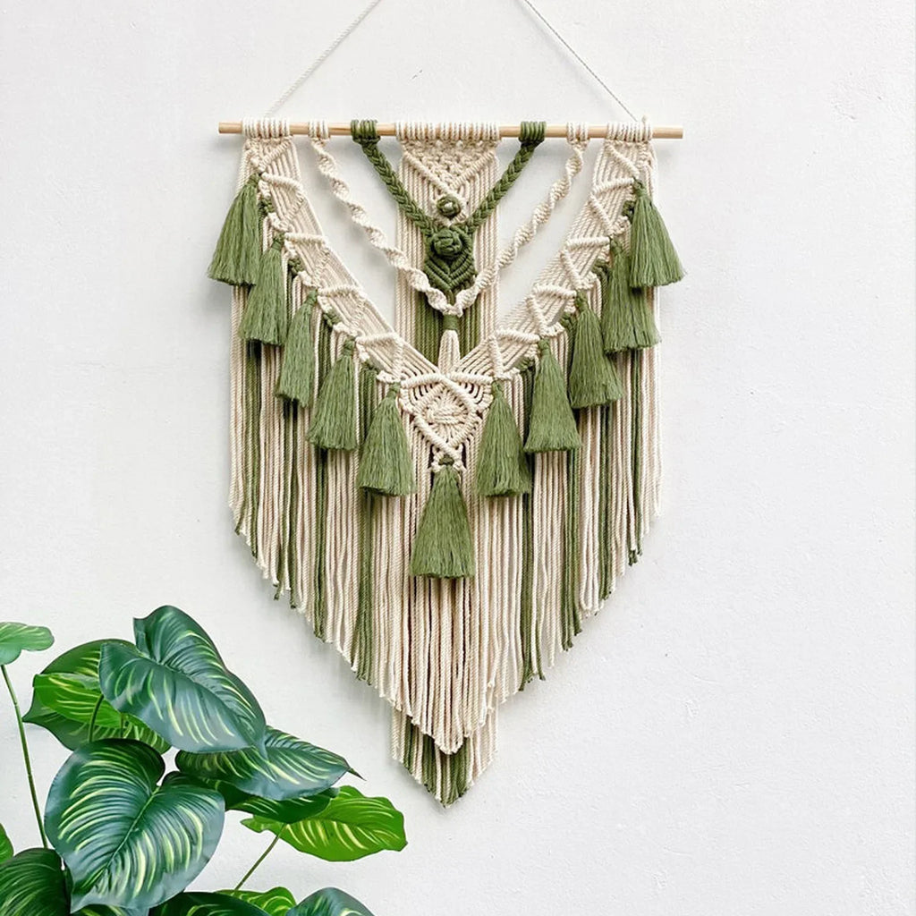 Two-tone macrame wall hanging with natural and green cotton cord, geometric pattern