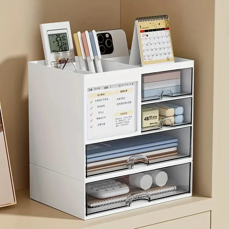 White desktop drawer organizer with pens, notepads, and calendar on a home office desk