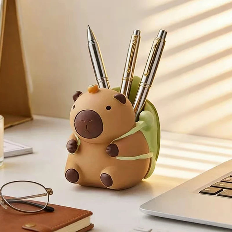Animal-shaped resin pen holder with pens under natural light