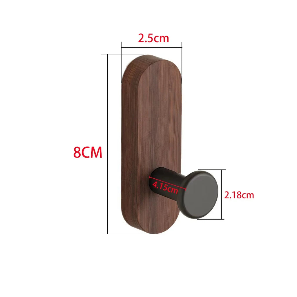 Single dark wood wall hook with black peg shown with dimensions labeled in centimeters