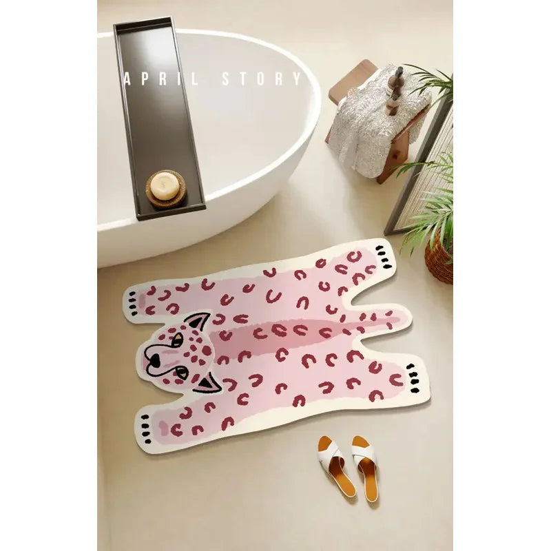 Pink leopard cartoon animal shaped rug on bathroom floor