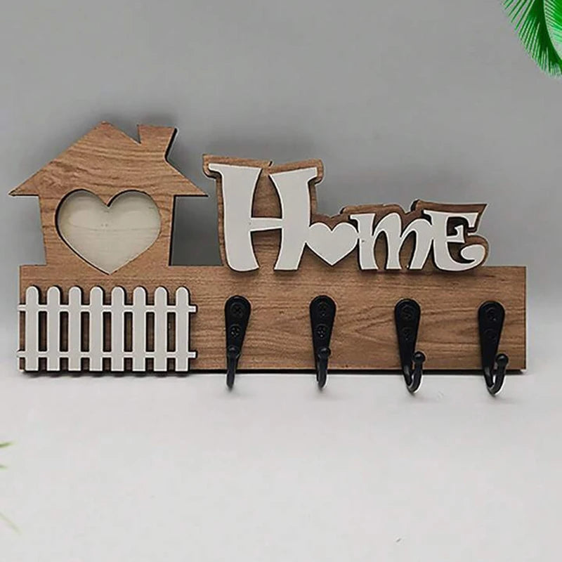 close view of wooden key holder wall rack with four hooks and home design