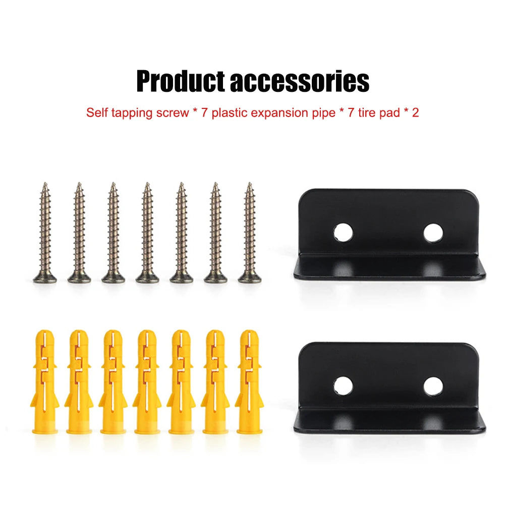 Accessory set for bicycle wall rack including screws, yellow wall plugs, and two black support pads