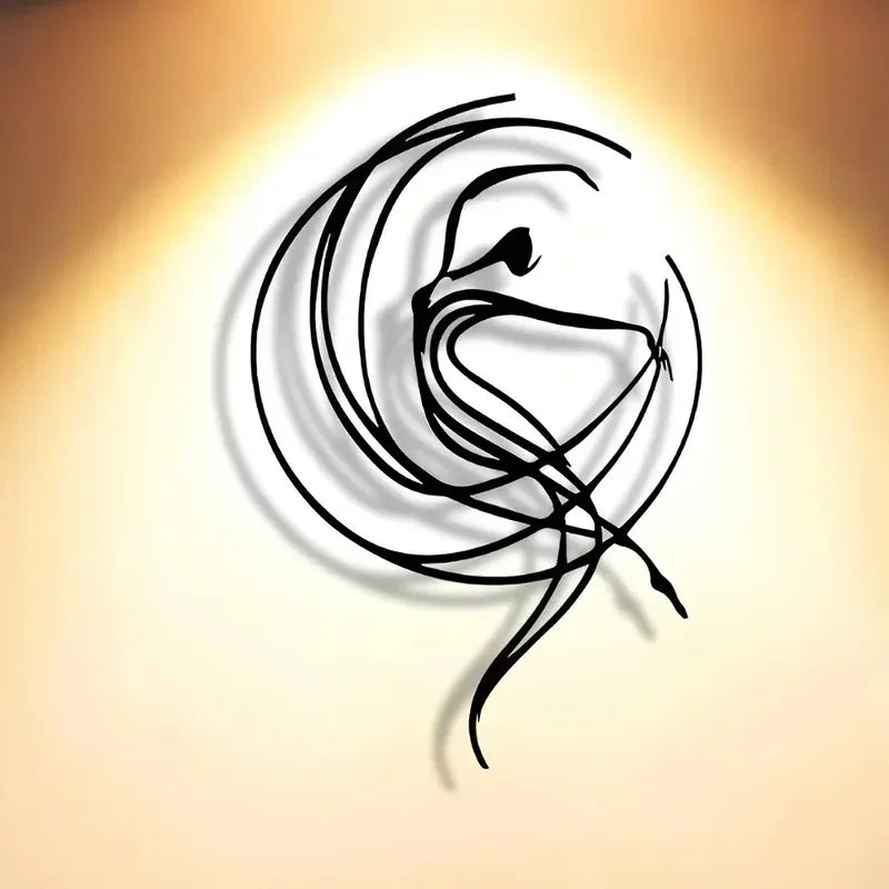Minimalist black metal wall art of a dancing figure on a softly lit wall