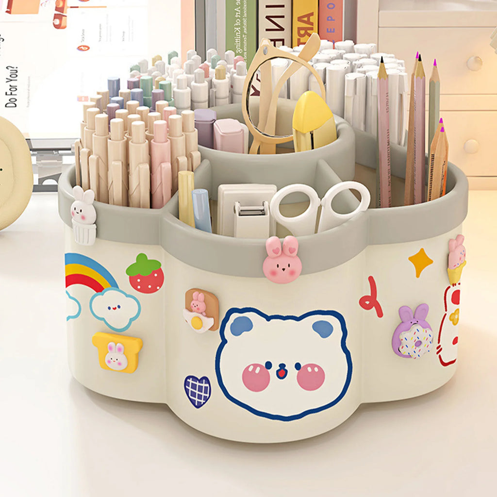 White and gray kawaii rotating desk organizer filled with colorful stationery on a desktop