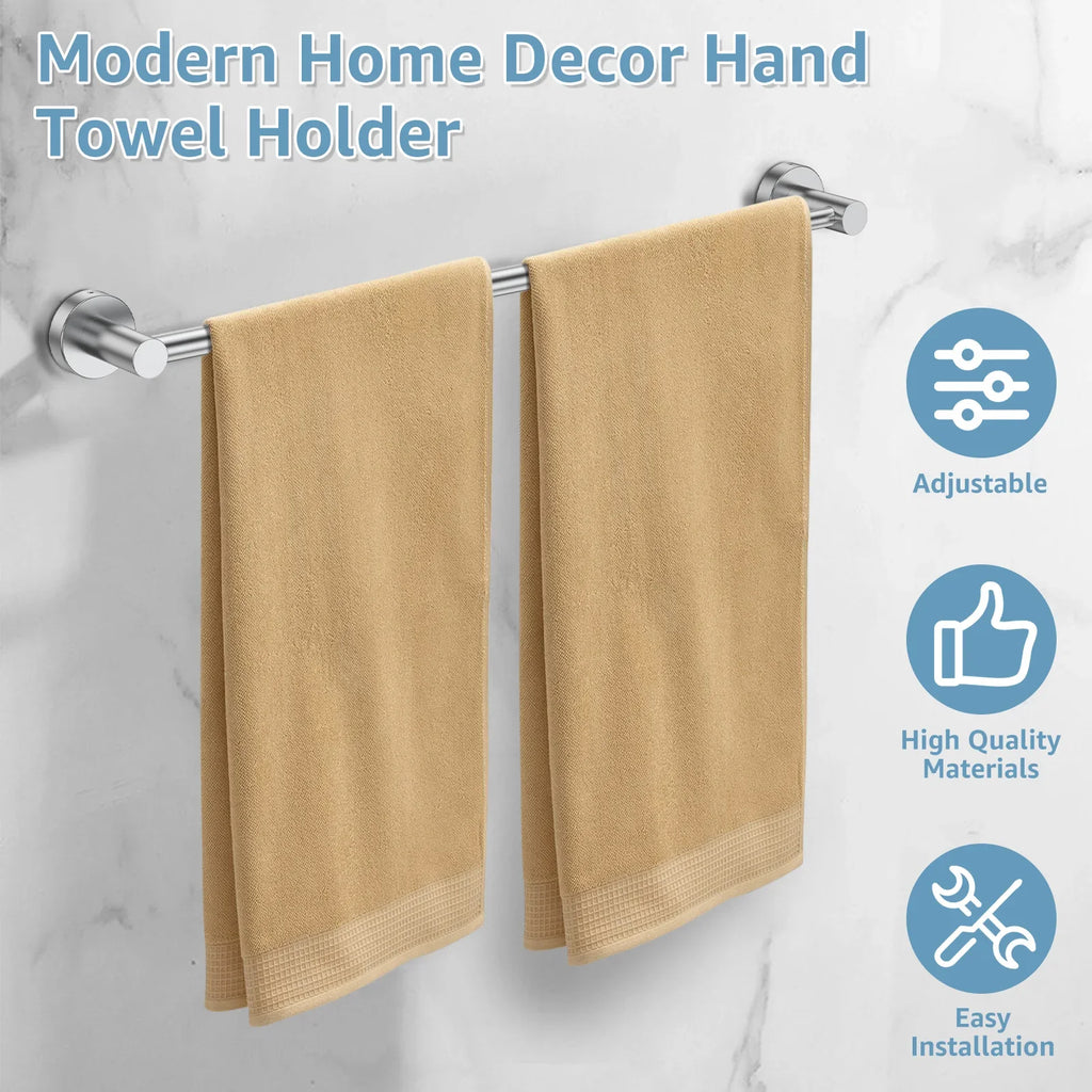 Modern wall-mounted towel bar in silver holding two beige hand towels
