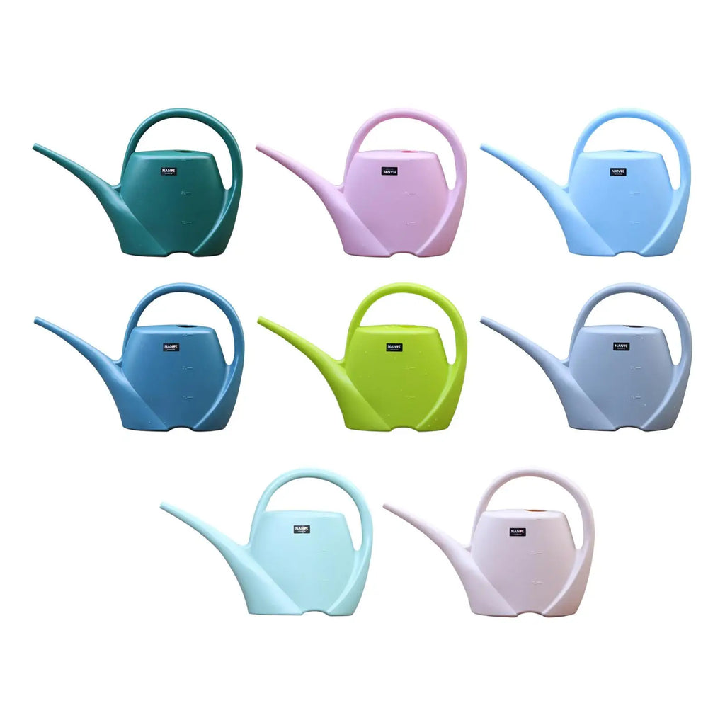 Assorted pastel and neutral large plastic watering cans in multiple colors
