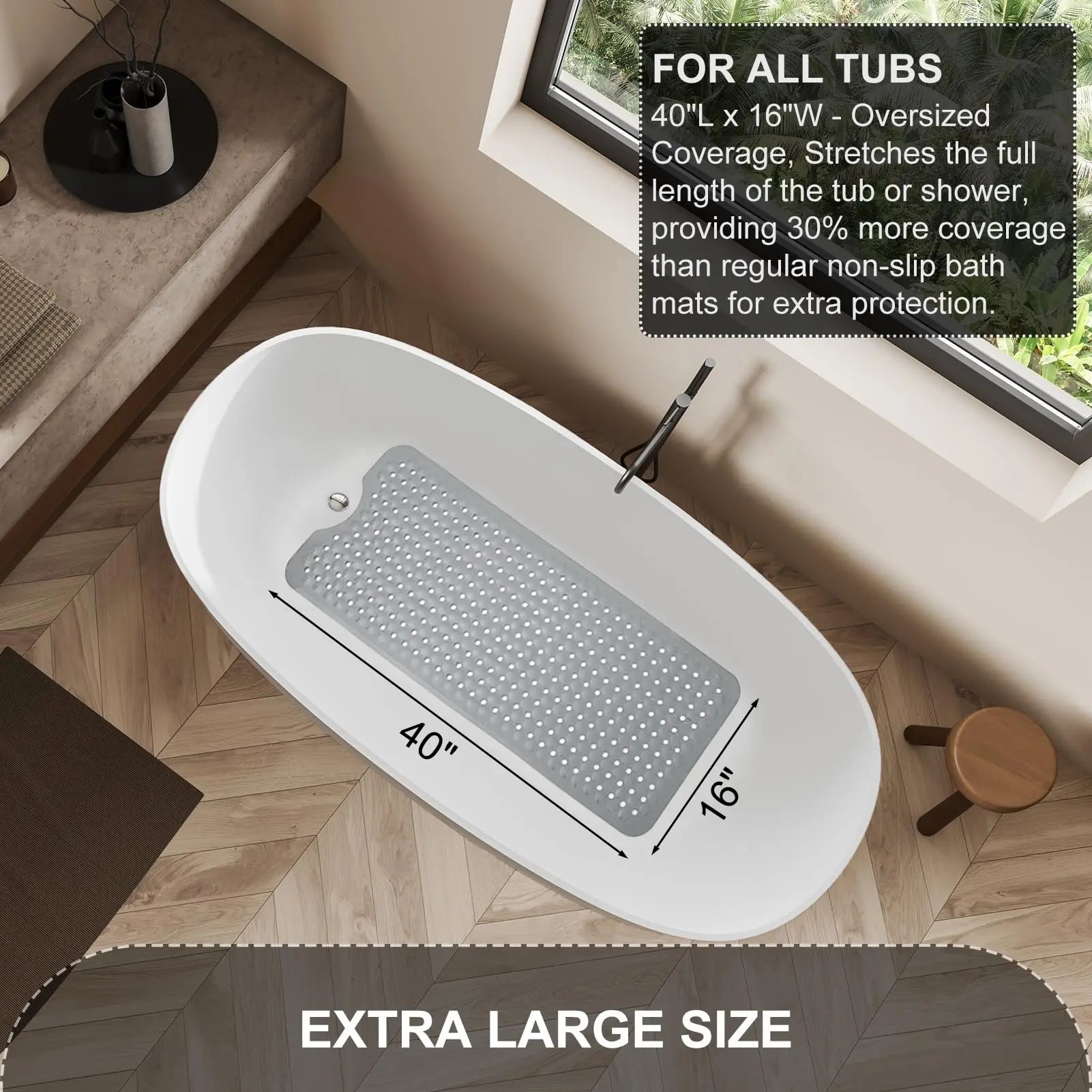Extra large grey bath mat placed in an oval bathtub, showing size dimensions of 40 inches by 16 inches.