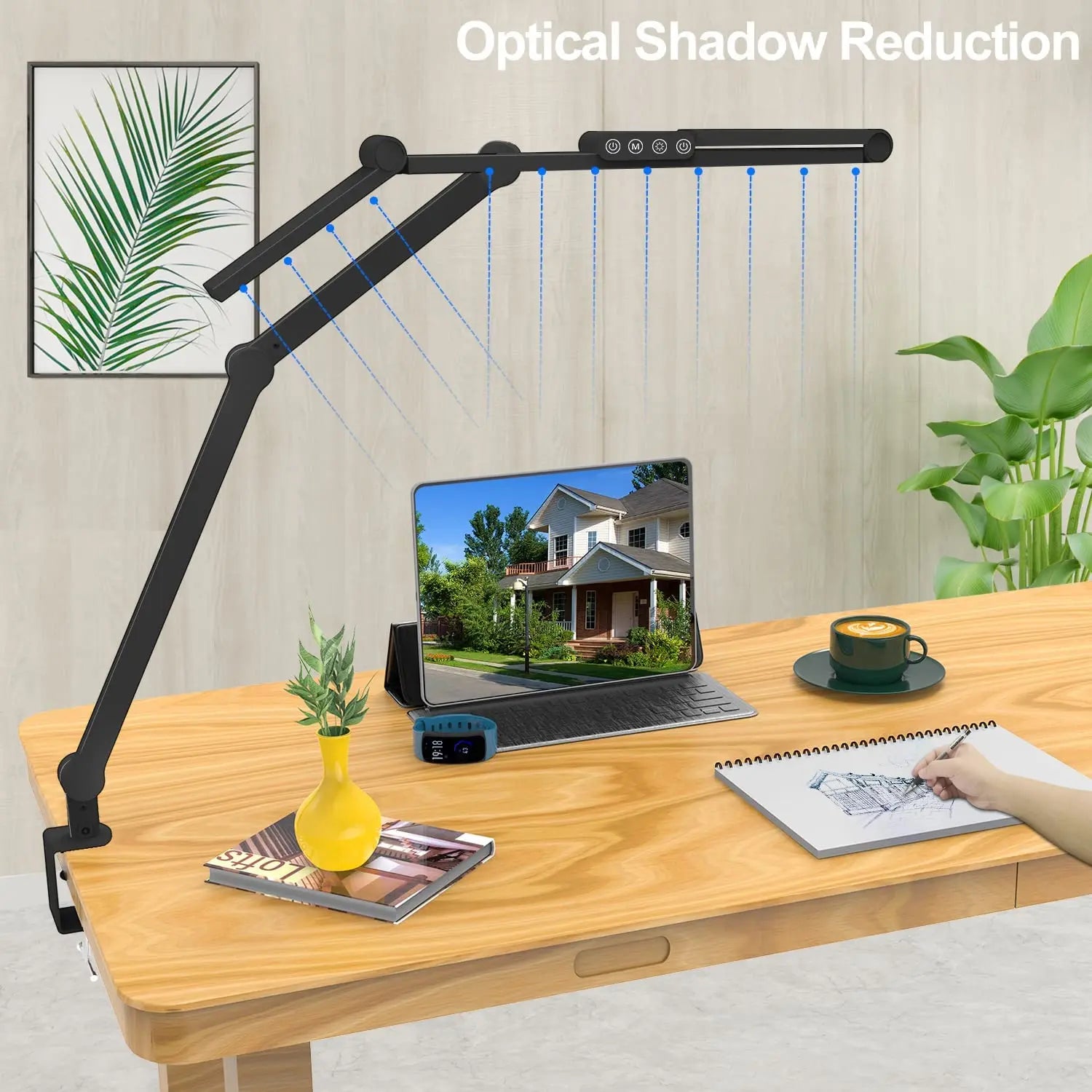Adjustable clamp desk lamp with rotating arms offering shadow reduction for a tablet and sketching on a tidy desk
