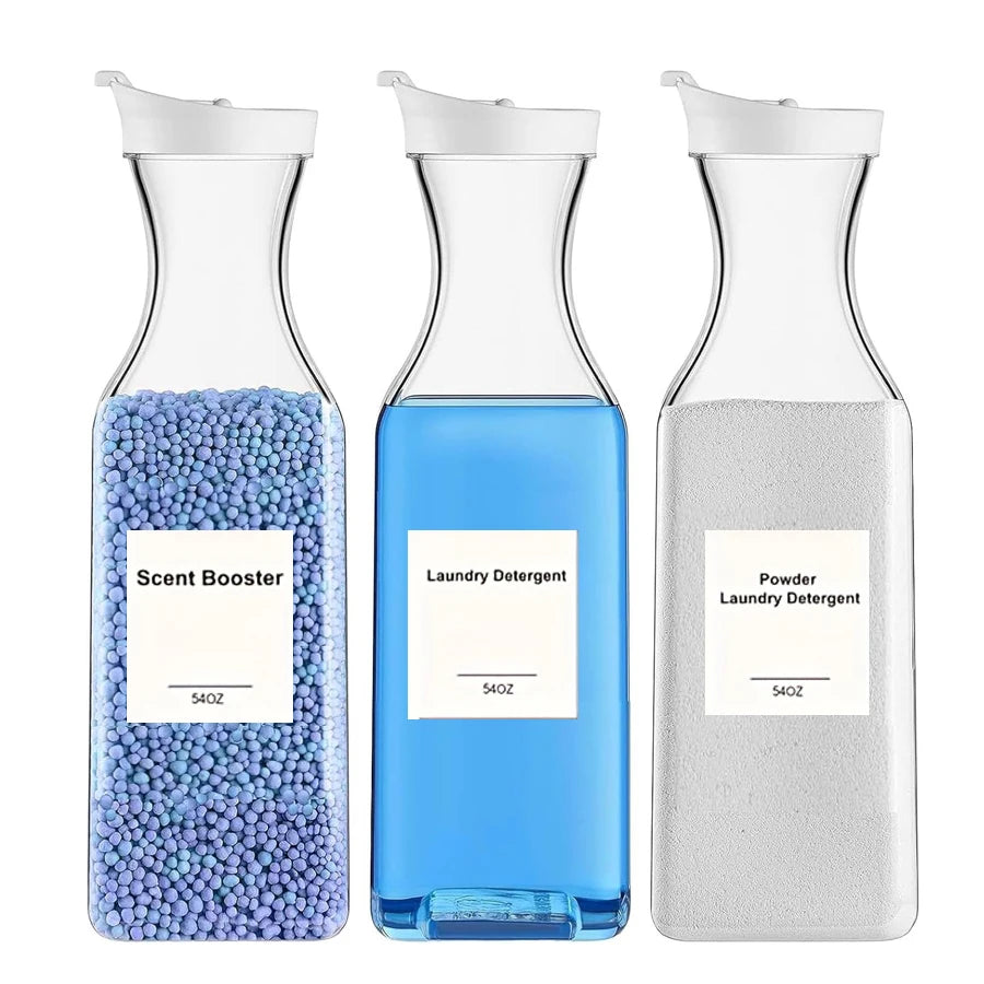 Set of three clear plastic laundry dispenser bottles with white lids labeled for scent booster, laundry detergent, and powder detergent