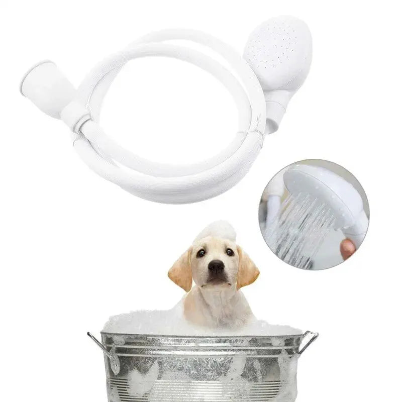handheld white pet bath sprayer and hose next to a dog in a wash tub