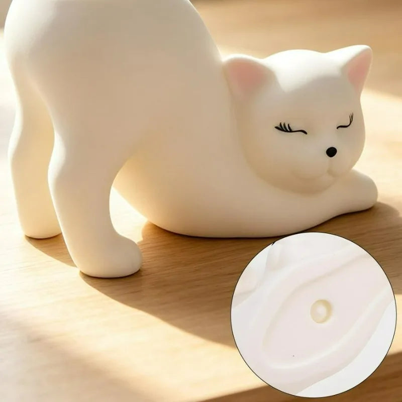 Close-up of cat planter body and drainage hole detail