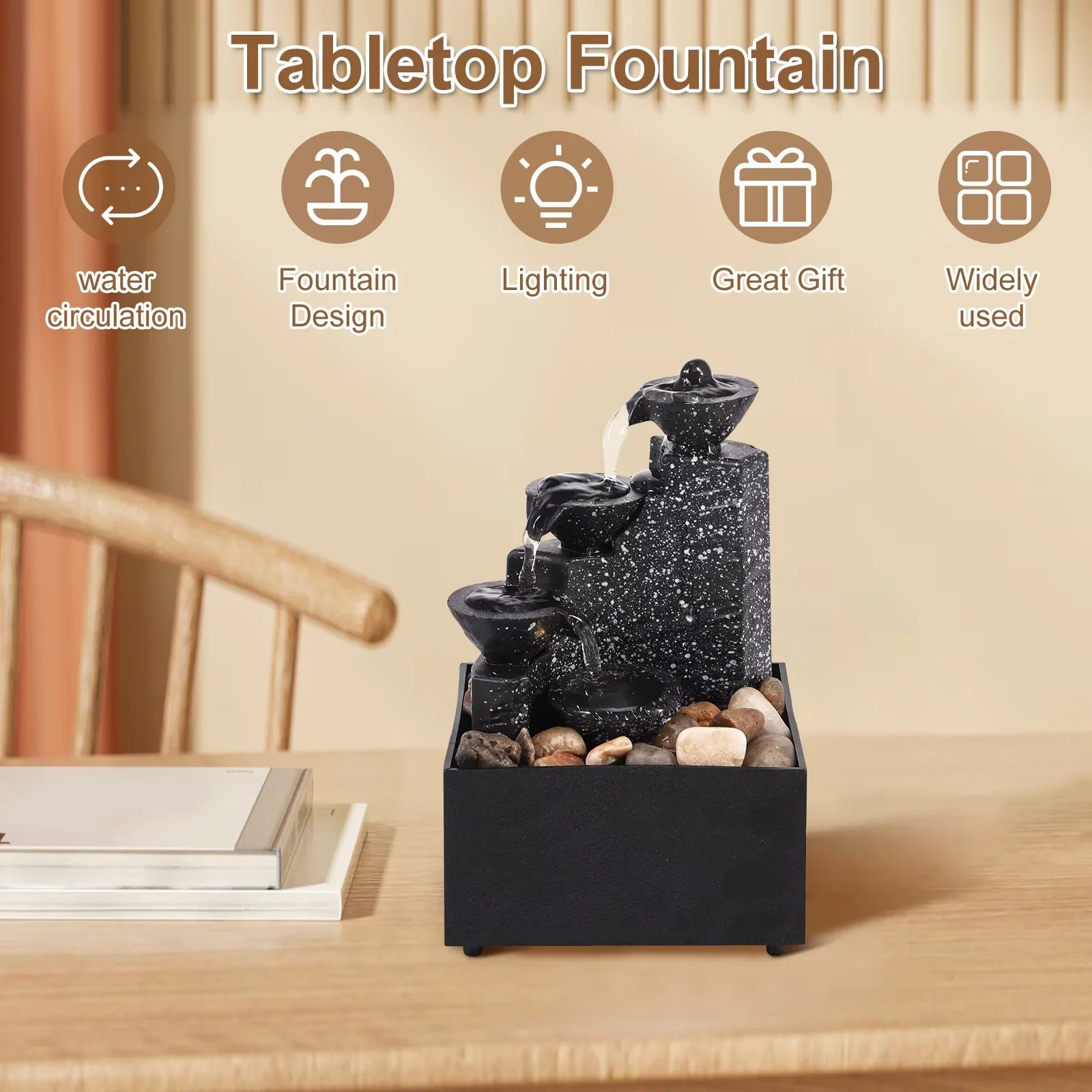 Compact desktop fountain with LED light and pebbles on a wooden surface, surrounded by icons for water circulation, design, lighting, and gift use