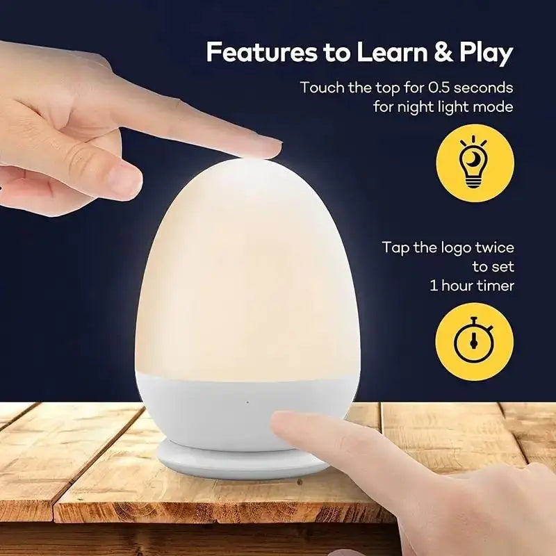 Hand touching the top of the egg night light to activate touch controls and timer