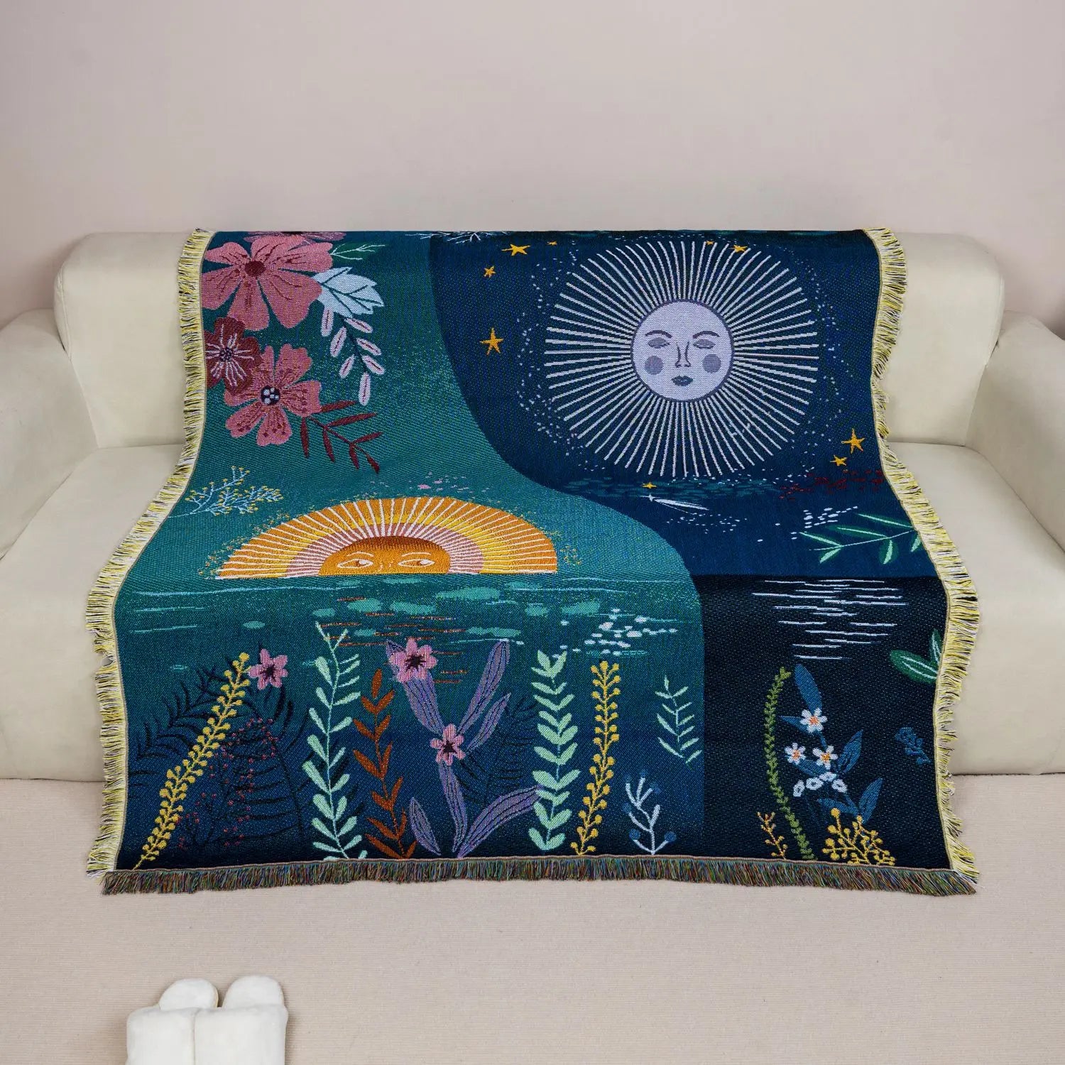 Sun and moon jacquard tapestry draped over a sofa