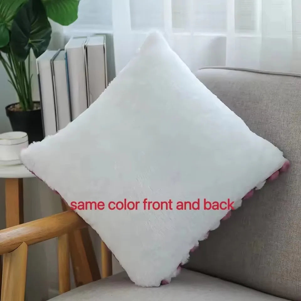 Back view of plush pillow cover showing same color front and back, placed on a modern armchair