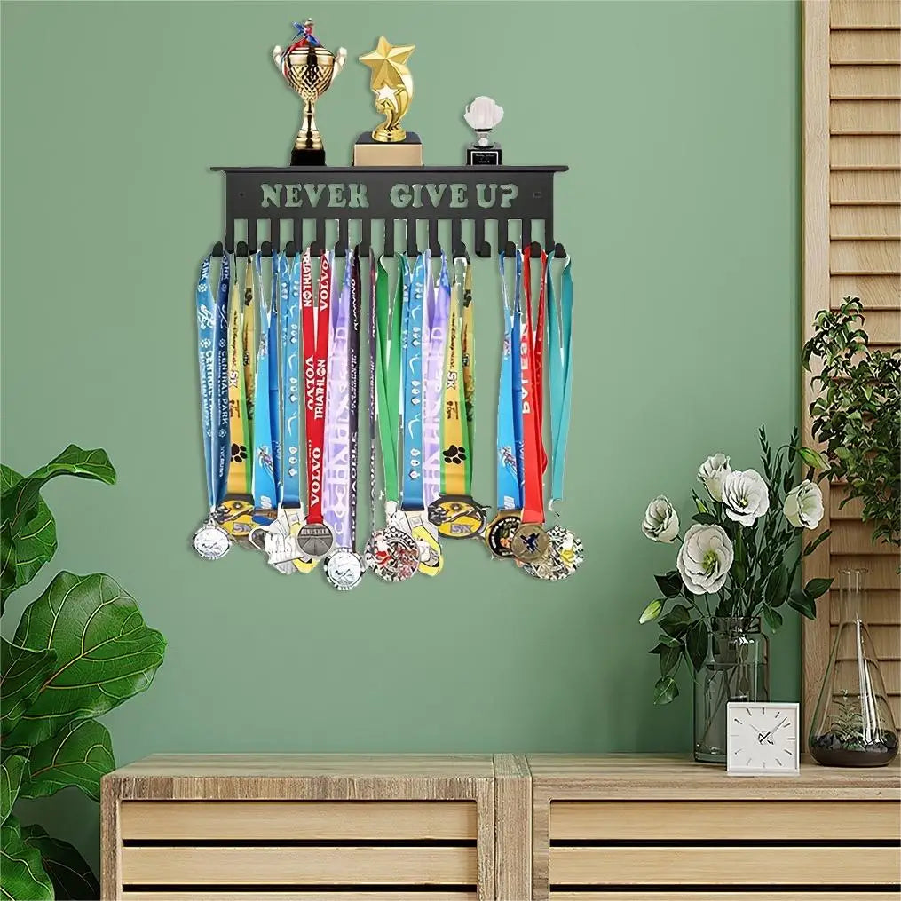 Medal and trophy display rack mounted on a green wall above a wooden console in a decorated room