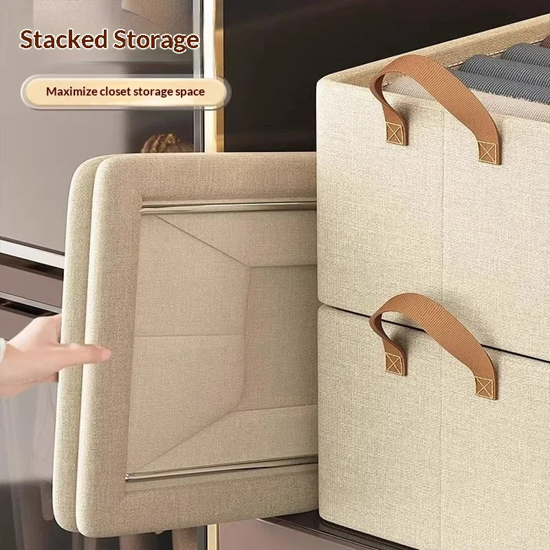 Hand holding the base of a beige stackable storage box, showing solid frame construction