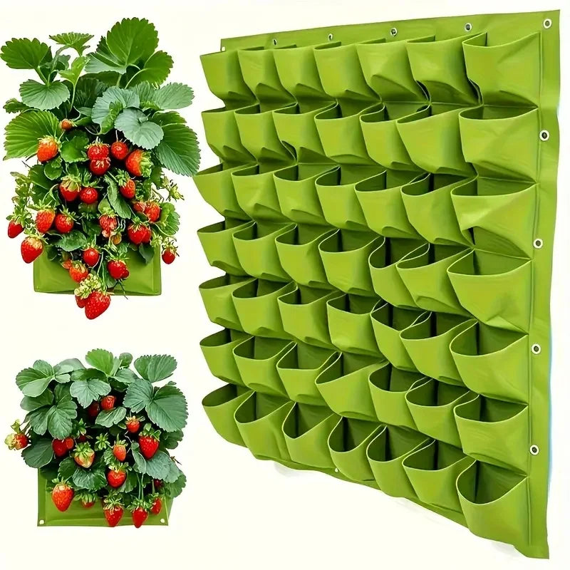 Vertical garden planter with 18 pockets showing strawberries and herbs planted