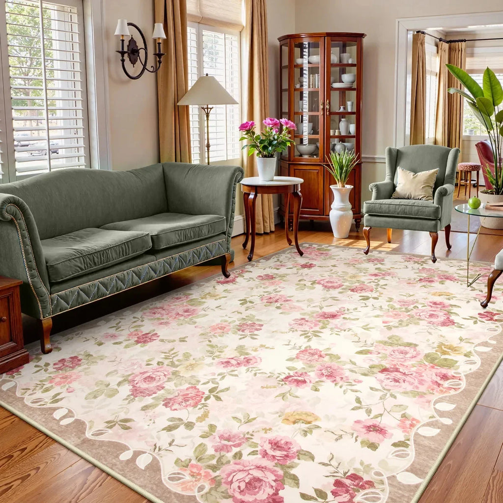 Vintage rose botanical area rug in a classic living room with green sofa