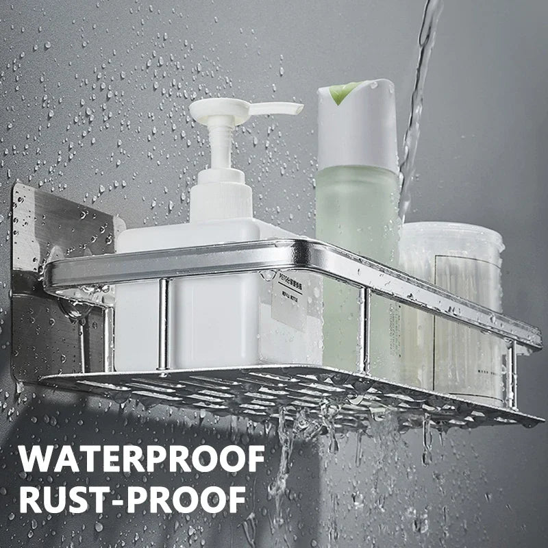 Silver metal rectangular shower shelf mounted on wall, water flowing over bottles, waterproof and rust-resistant text