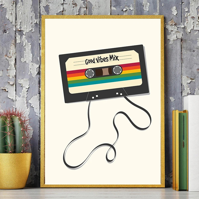 Retro cassette tape 'Good Vibes Mix' canvas wall art print with rainbow stripes, displayed with books and decor