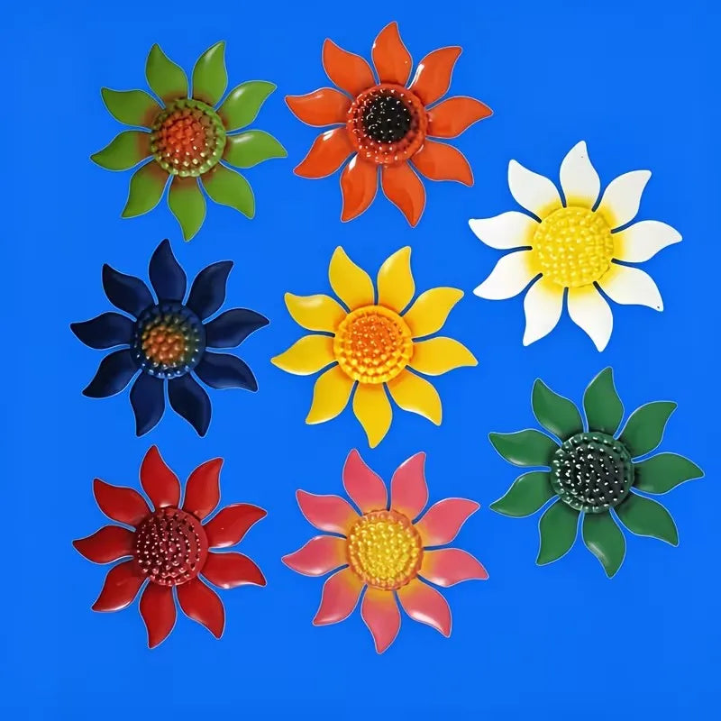 Eight colorful metal flower wall decorations on blue background