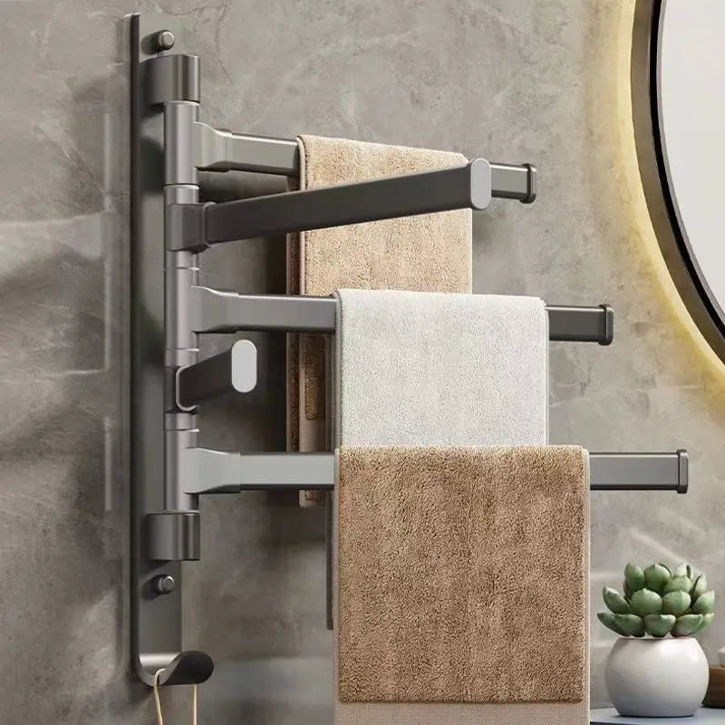 Gray aluminum wall-mounted towel rack with towels in a modern bathroom