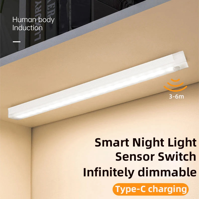 White rechargeable motion sensor LED night light installed under a shelf