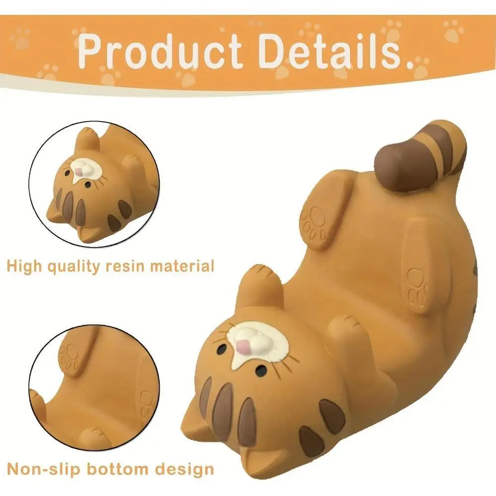 Brown and white resin cat phone stands on desk supporting smartphones, styled for hands-free use