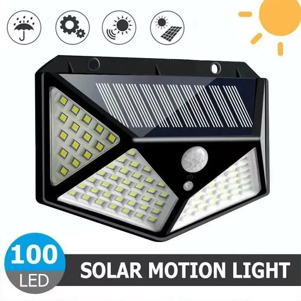 Black solar motion sensor wall light with 100 LEDs and solar panel, shown close up