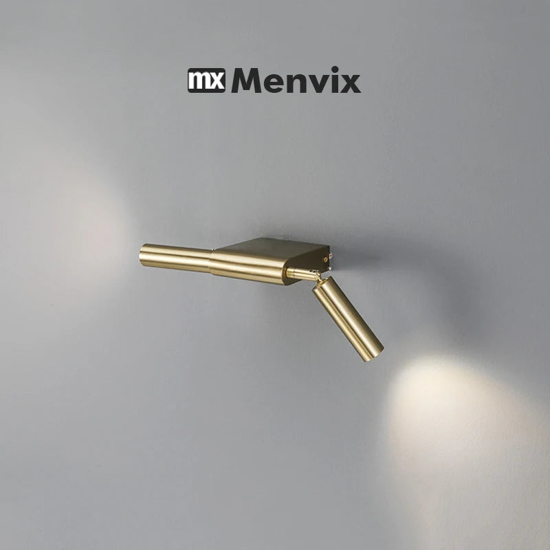 Gold finish modern wall sconce installed horizontally with two beams of LED light