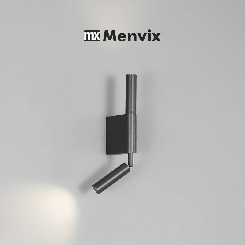 Black aluminum wall sconce mounted on wall with adjustable LED light beam