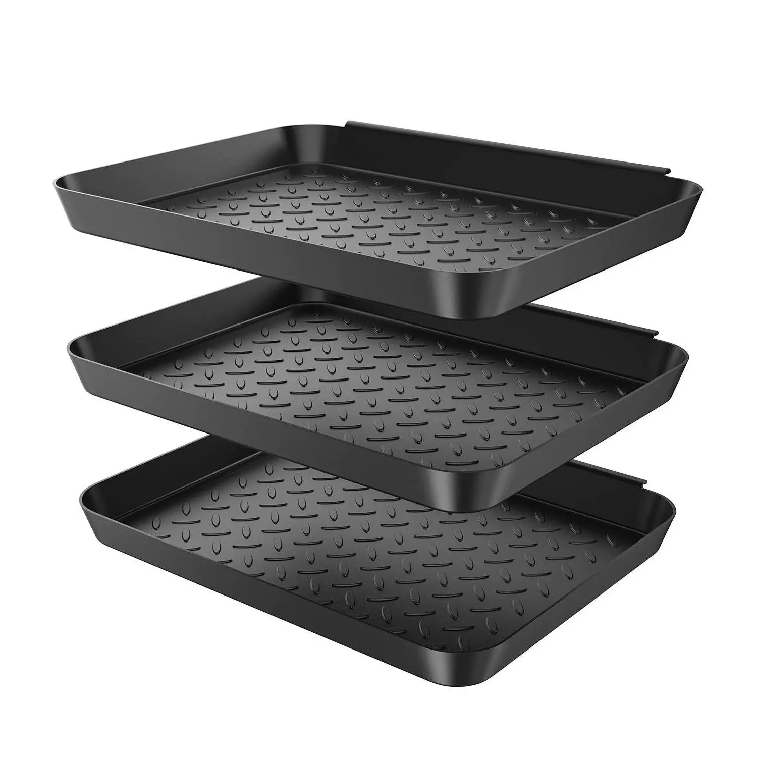Three stackable black plastic boot trays with textured surface