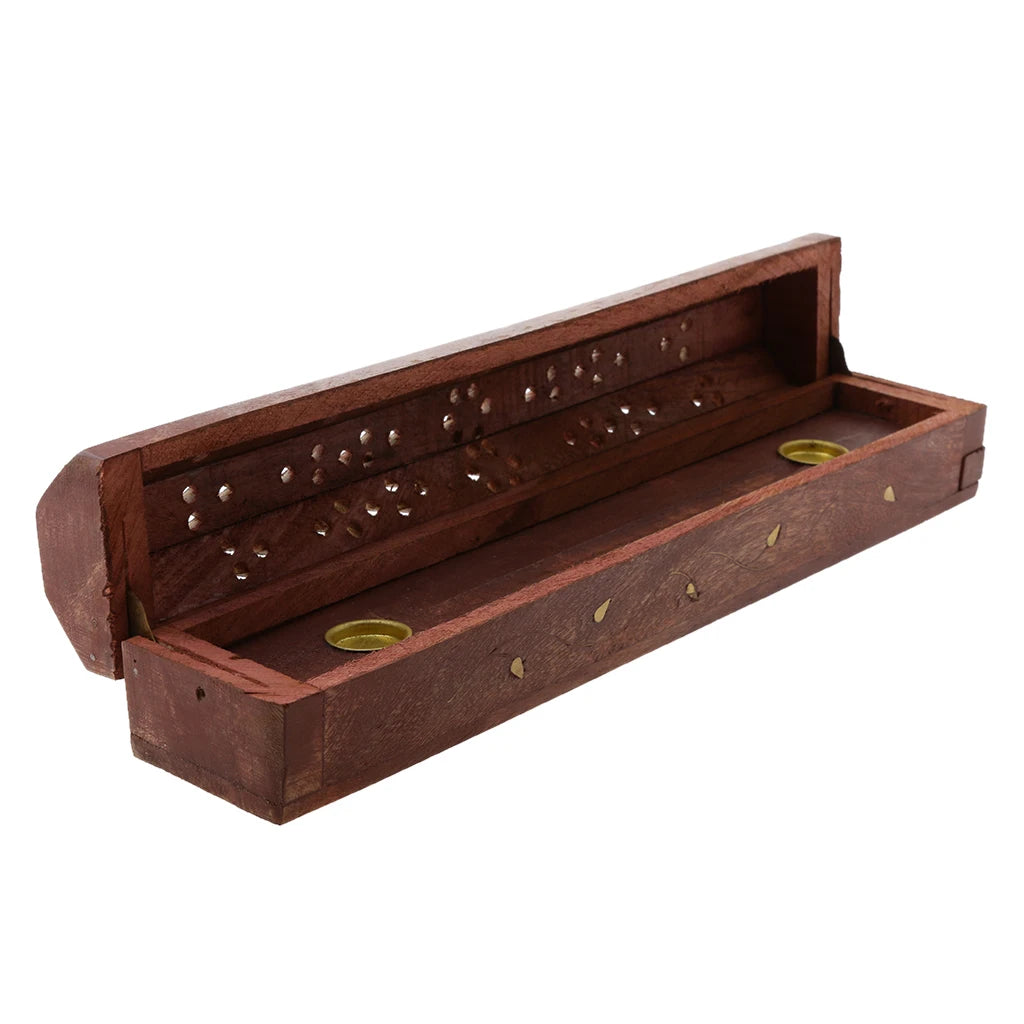 Hand-carved wooden incense holder box open, showing brass holders inside