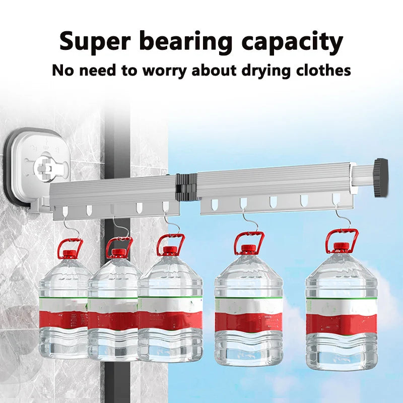 Aluminum folding drying rack shown supporting heavy water jugs, demonstrating sturdy construction and hook design.