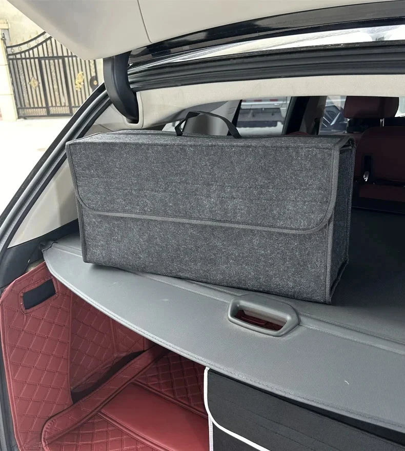 Grey felt car trunk organizer positioned on a rear cargo shelf in a vehicle
