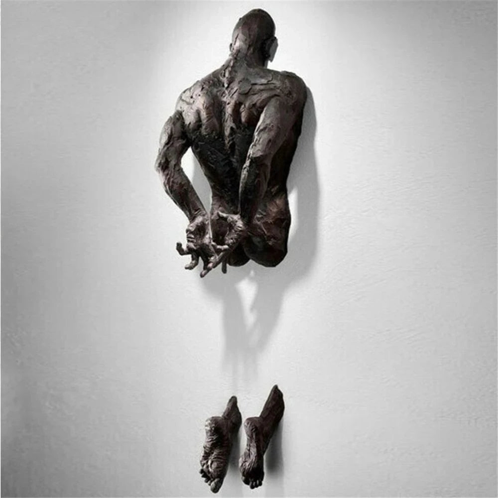 Resin abstract man wall sculpture with arms behind back, imitation copper finish